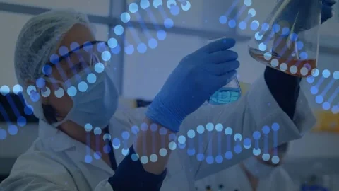 Lab tech raising blue flask, rotating amber flask, inspecting clarity while DNA Stock Footage 334034484
