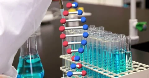 Lab tech reaching pipette initiating transfer while animated helix overlapping Stock Footage 330958878
