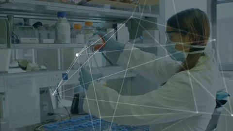 Lab tech reaching pipette, transferring samples into blue rack while network Stock Footage 335761912