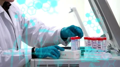 Lab tech reaching for red tube, loading centrifuge for test, teal overlays Stock Footage 333078620