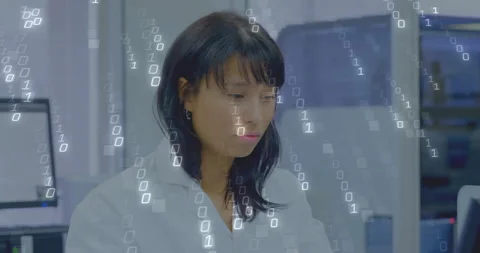 Lab tech reaching for test tube and examining sample with animated data overlays Stock Footage 313773199