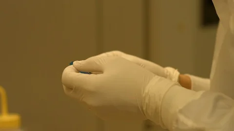 Lab tech with tweezers Stock Footage 106899773