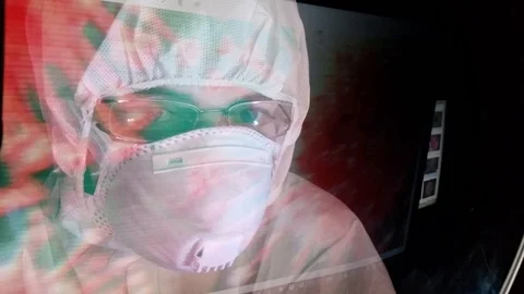 Lab Tech Watching a Picture of Coronavirus Virus Stock Footage 126289111