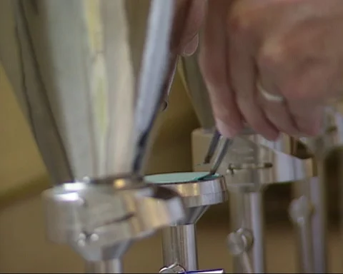 Lab technician exchanges a filter in water research - close up Stock Footage 126043238