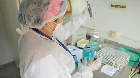 Lab technician taking sample Stock Footage 153100331