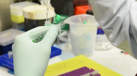 Lab Technician uses pipette Stock Footage 24883407