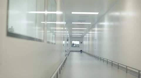 Lab Technician Walking Down Corridor Stock Footage 68642538