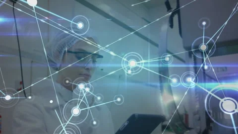 Lab technician watching holo node appearing, network expanding while tapping 스톡 동영상 332405284