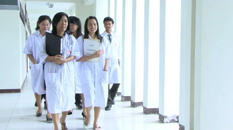 Lab Technicians Walk By 스톡 동영상 1067936