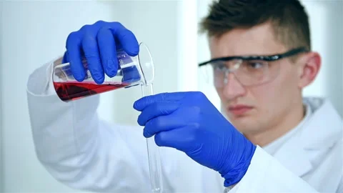 Lab Worker Pours Sample Into Test Tube Stock Footage 103156053