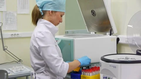 Lab worker preparing test blood for detection of antibodies and infections Stock Footage 265594391