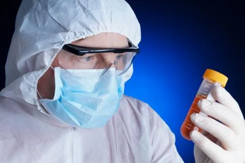 Lab worker testing a sample Stock Photos