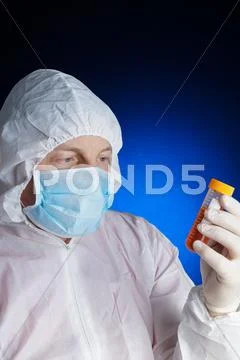 Lab worker testing a sample 写真素材