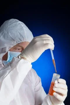 Lab worker testing a sample Stock Photos