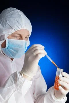 Lab worker testing a sample Stock Photos