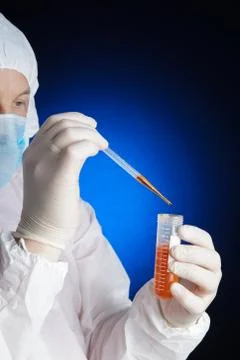 Lab worker testing a sample Stock Photos