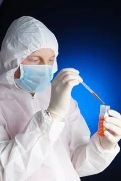 Lab worker testing a sample Stock Photos