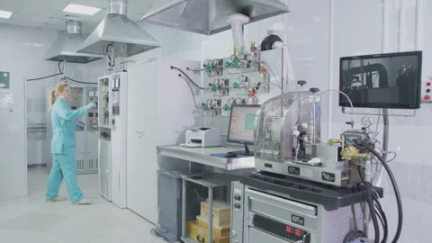 Lab workplace with devices computer printer and girl employee Stock Footage 93175585