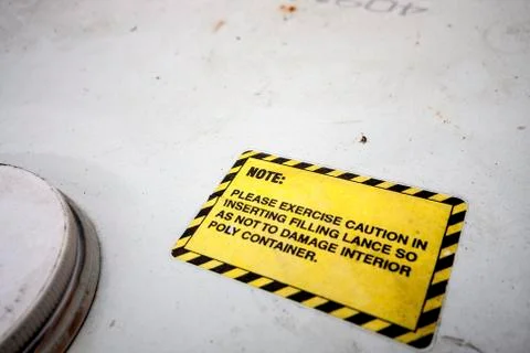 Label  caution Stock Photos