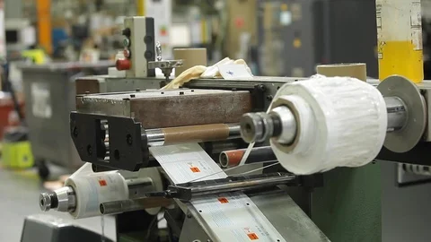 Label Printing Rolls with High speed labeling machine in industrial factory, Vídeo Stock 110771813