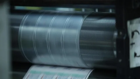 Label Shapes Printing Rolls with High speed labeling machine in industrial Stock Footage 110771763