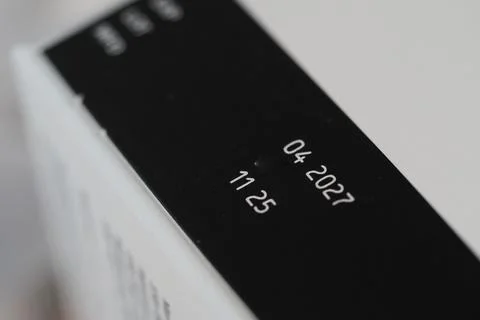 Label showing date and time from a medicine packaged item Stock Photos