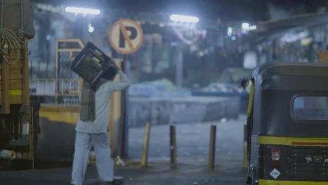 Labor carrying box at the market Stock Footage 120720341
