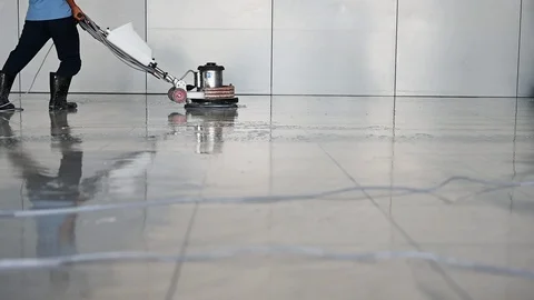 Labor cleaning the floor with cleaning machine - Slow motion Stock Footage 117129352