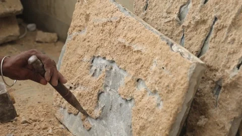 The labor cleaning marble tile and renovating the floor using hammer and chisel. Stock Footage 245100857