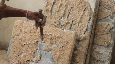 The labor cleaning marble tile and renovating the floor using hammer and chisel. Stock Footage 245100984