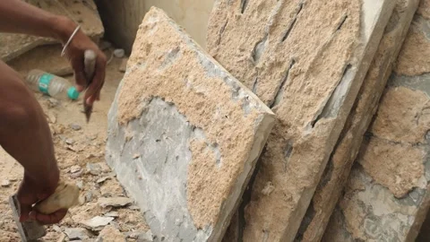 The labor cleaning marble tile and renovating the floor using hammer and chisel. Stock Footage 245101007