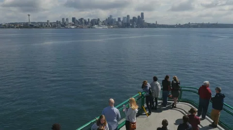 Labor Day travelers take photos as ferry approaches Seattle Stock Footage
