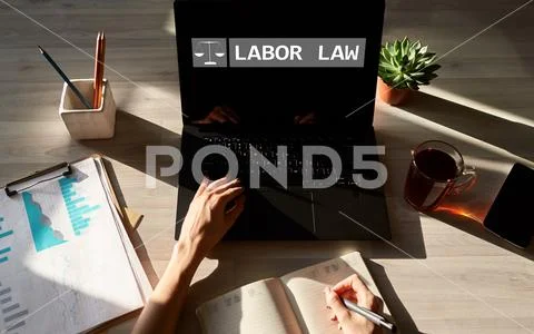 Labor law icon and text on device screen. Stock Photos