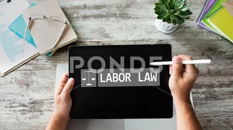 Labor law icon and text on device screen. Stock Photos
