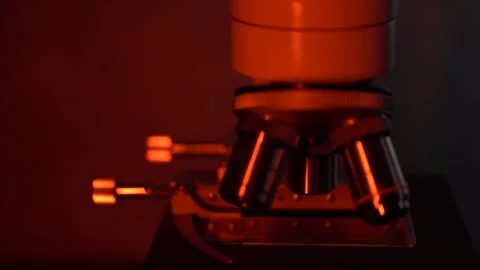Labor microscope close up in red light Stock Footage 272309756