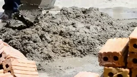 Labor mix cement in construction site Stock-Footage 98247934