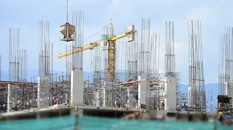 Labor working in big construction site Stock Footage 32342860