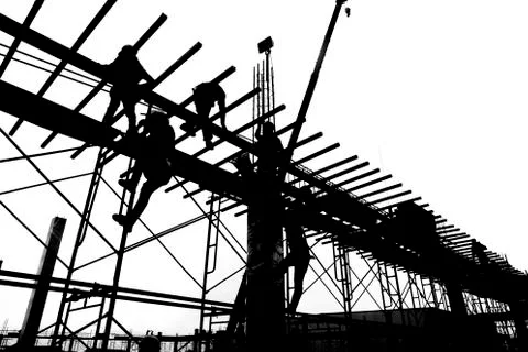 Labor working in construction site Stock Photos