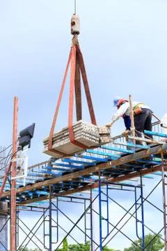 Labor working in construction site Stock Photos