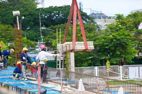 Labor working in construction site Stock Photos