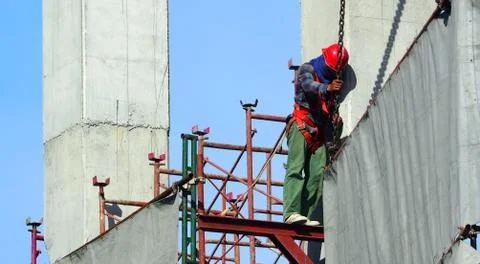Labor working on construction site. Stock Photos