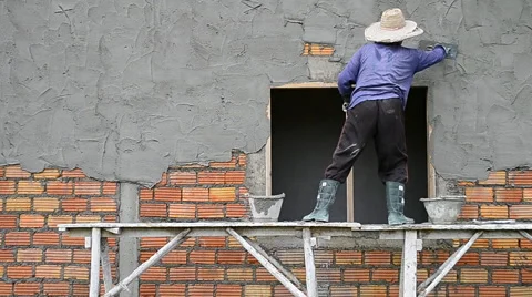 Labor Working Plaster Wall In Construction Site Video stock 56724908
