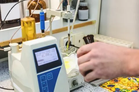 Laborant makes test in laboratory Stock Photos