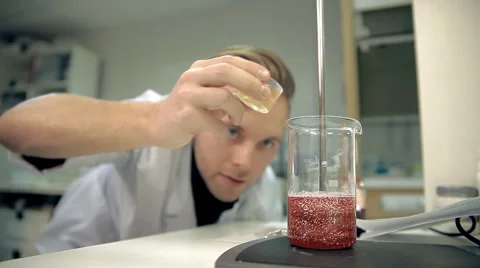 The laboratorian is adding an ingredient into personal care products Stock Footage 59109729