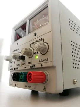 Laboratory adjustable voltage DC power supply for electronics engineering wor Stock Photos