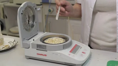 Laboratory analysis of cake Stock Footage 75388716