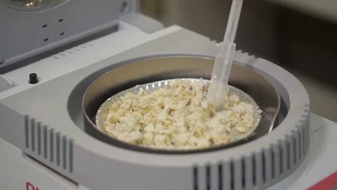 Laboratory analysis of cake on laboratory scales Stock Footage 75388776