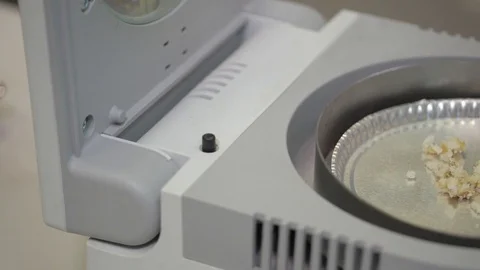 Laboratory analysis of cake on laboratory scales, close-up Stock Footage 75388880