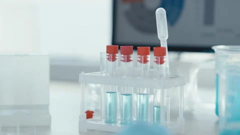 Laboratory analysis utilizing test tubes and pipettes plays an essential role in Stock-Footage 290116220