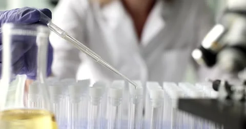 Laboratory and scientific experiments and formulation of chemicals for medical Stock Footage 261530677